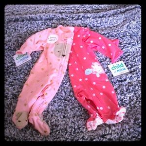 2 pack Carter’s zip/ footed onesie